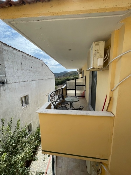 Ammolofos apatmanház, busszal