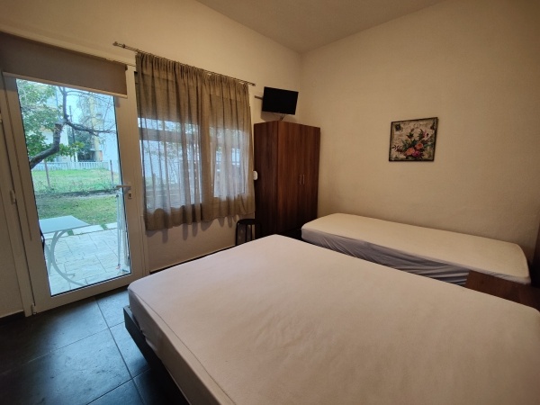 Kyriaki apartmanház, busszal