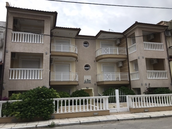 Spanos Apartmanház, busszal